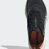 Intersport Adidas Terrex Agravic Speed Women(IE7671) core black/grey one/amber tint negro Zapatillas running