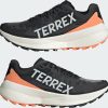 Intersport Adidas Terrex Agravic Speed Women(IE7671) core black/grey one/amber tint negro Zapatillas running